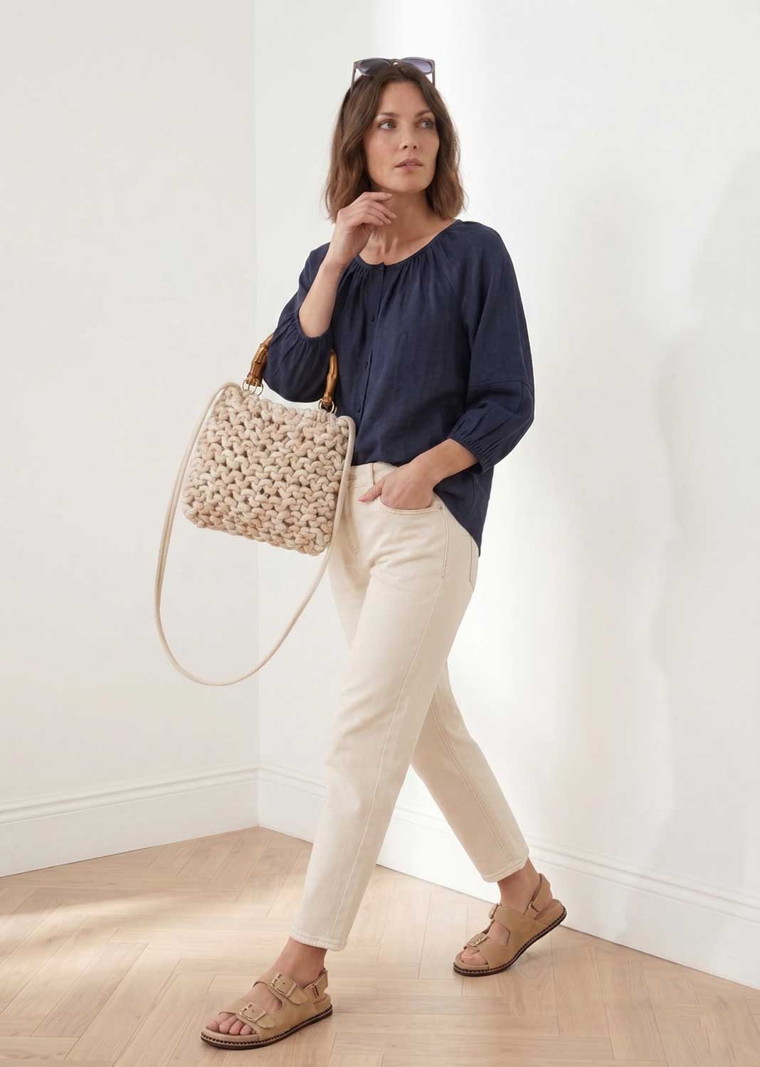 cream woven crossbody bag with woven handle 