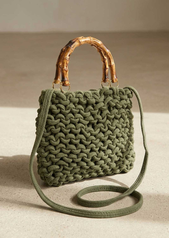 khaki woven crossbody bag with bamboo handle