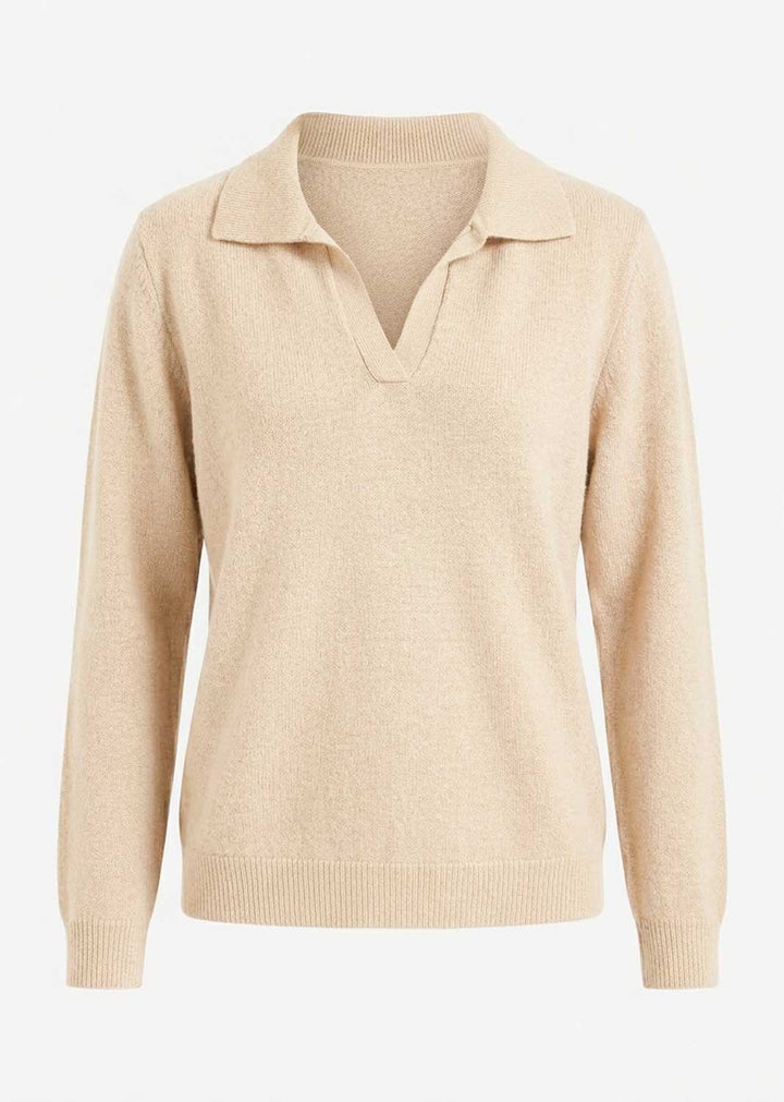 A light beige knit polo sweater with a collar and long sleeves, shown against a plain white background.