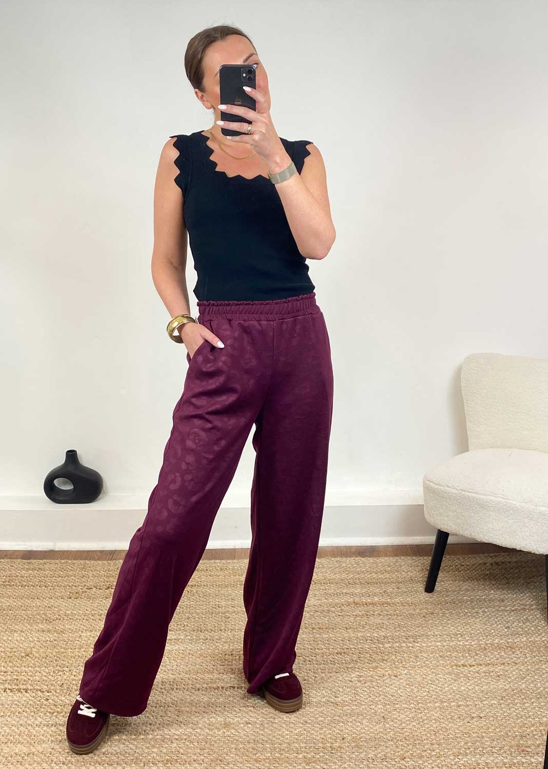 Burgundy leopard wide leg trousers with elasticated waist and pockets 