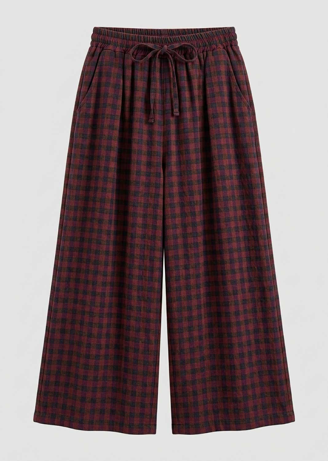 Plaid wide-leg cropped pants in a dark red and black checkered pattern, featuring an elastic drawstring waistband, shown against a light gray background.