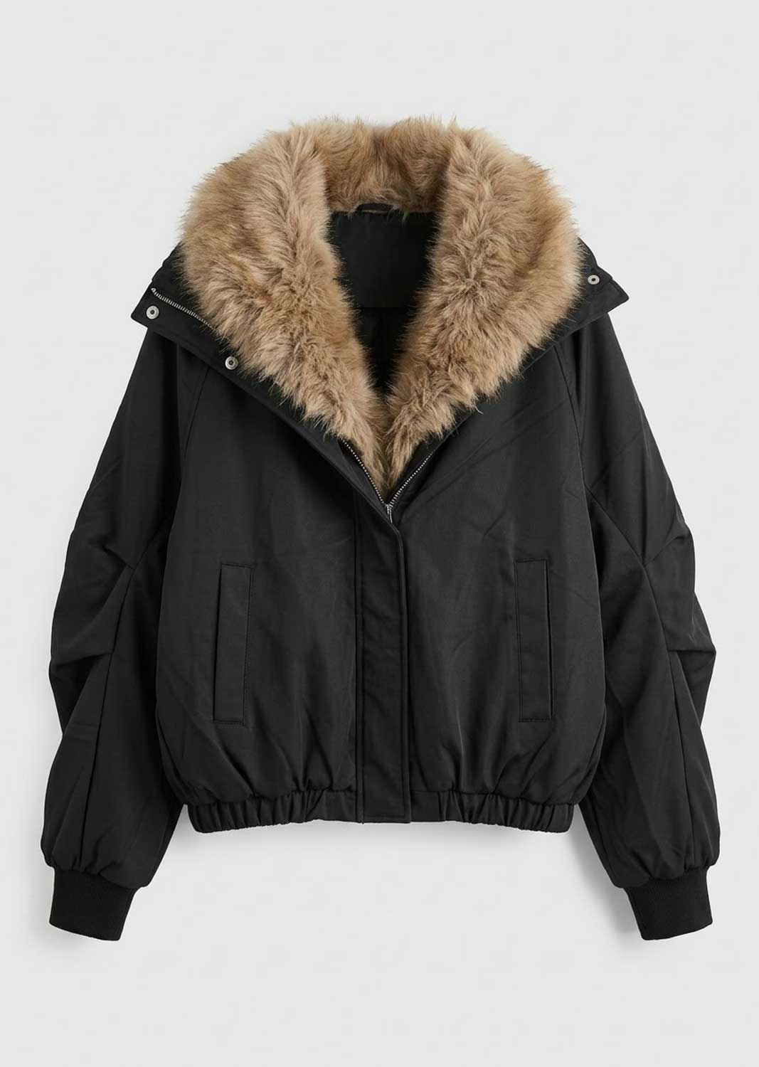 A black puffer jacket with a large tan faux-fur collar, shown flat against a light gray background.