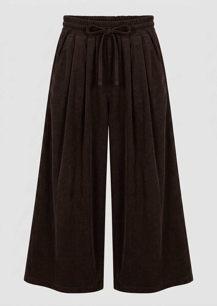 Dark brown wide-leg  pants with an elastic drawstring waist, shown against a light gray background.