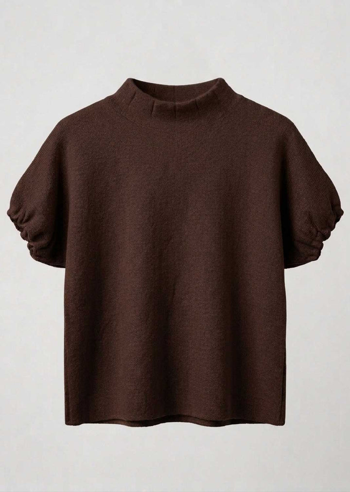 A dark brown knit mock-neck top with short, voluminous puff sleeves, shown against a plain light gray background.