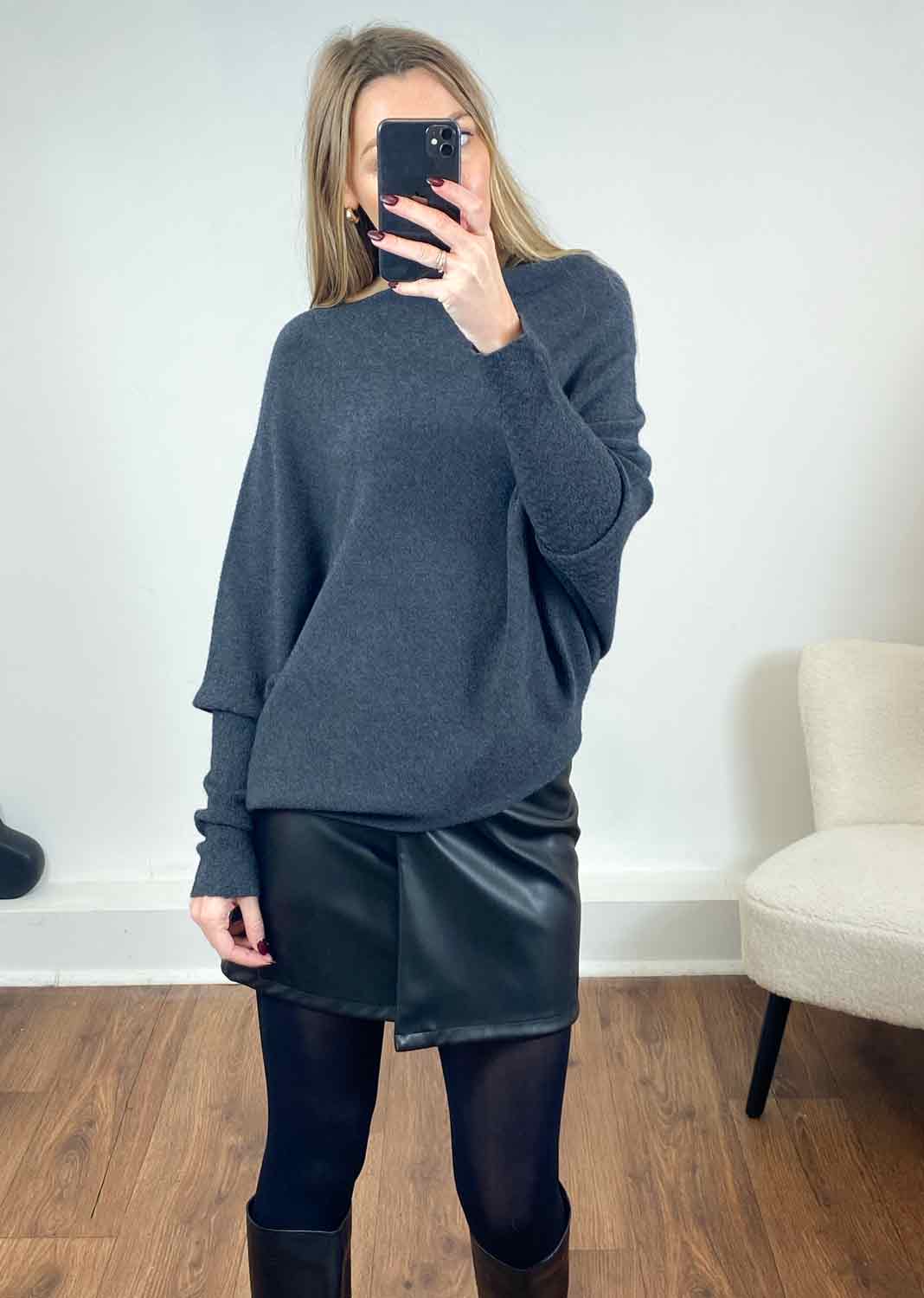 Black asymmetric outlet jumper